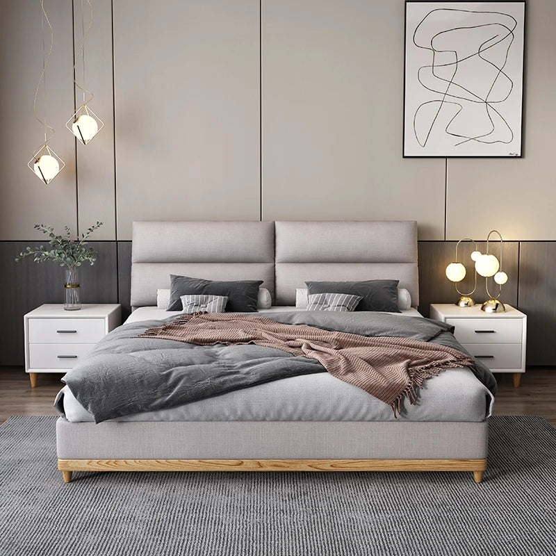 Cream leather queen bed with solid wood frame, modern and elegant.