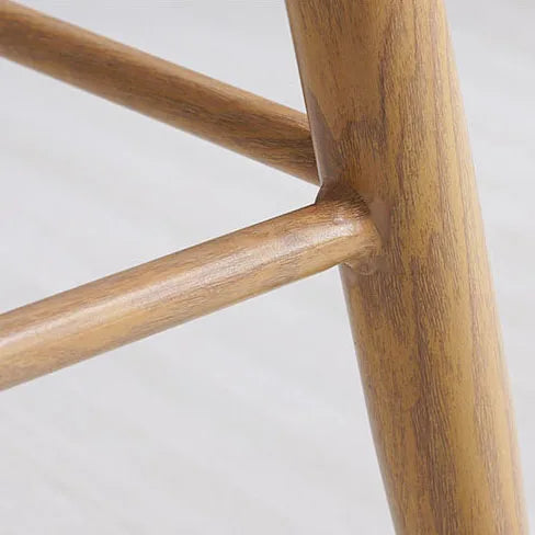 Industrial dining chair with plastic honeycomb top & wood-grain steel legs.