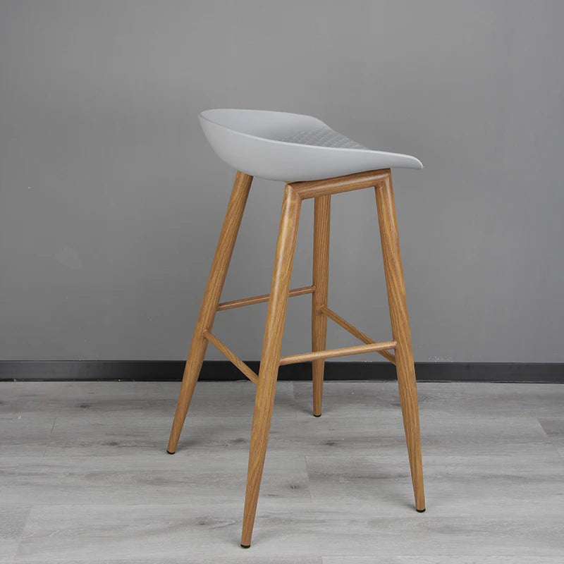 Industrial dining chair with plastic honeycomb top & wood-grain steel legs.